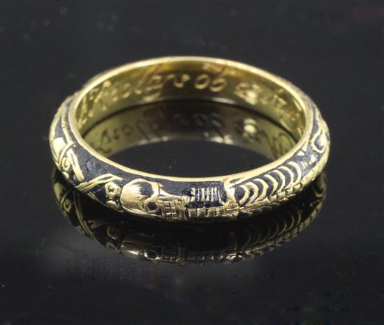 A George II gold and black enamel skeleton momento mori ring, size P/Q.